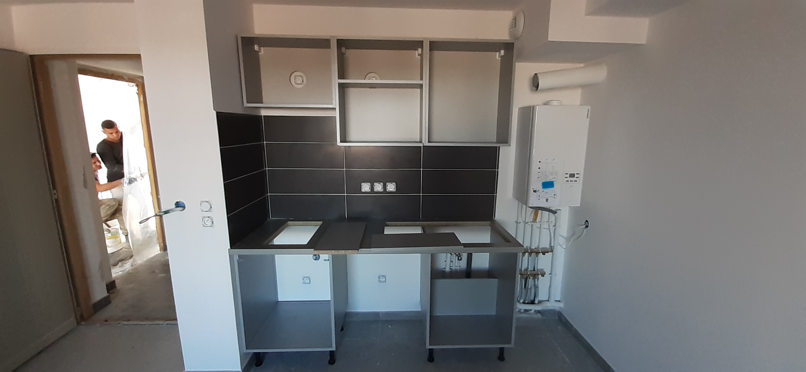 Pose de cuisine pour une location type appartement.